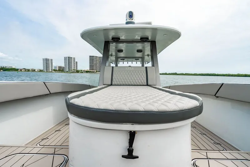 Slide: The Image of Custom 368 Center Console 2021 on the water with cityscape in the background. - 34