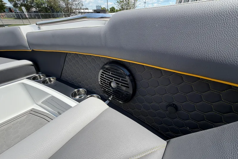 Slide: The Image of Interior of 2021 Cobalt R8 Surf boat with speaker and cup holders. - 16