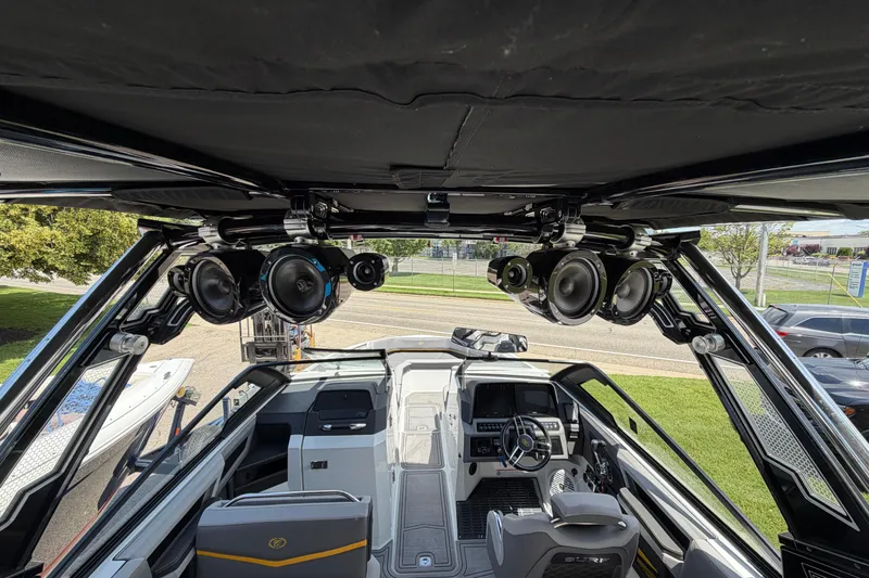 Slide: The Image of Interior view of 2021 Cobalt R8 Surf boat with advanced audio system. - 18