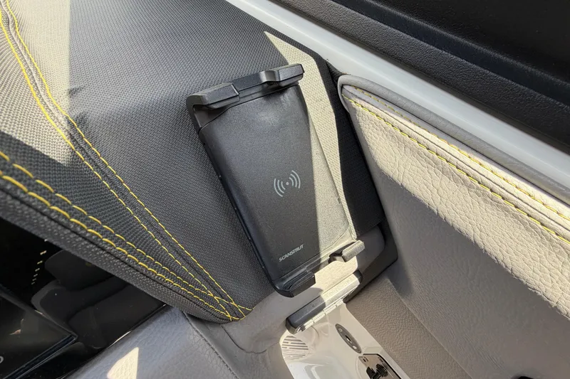 Slide: The Image of Close-up of a phone holder in a Cobalt R8 Surf boat. - 24