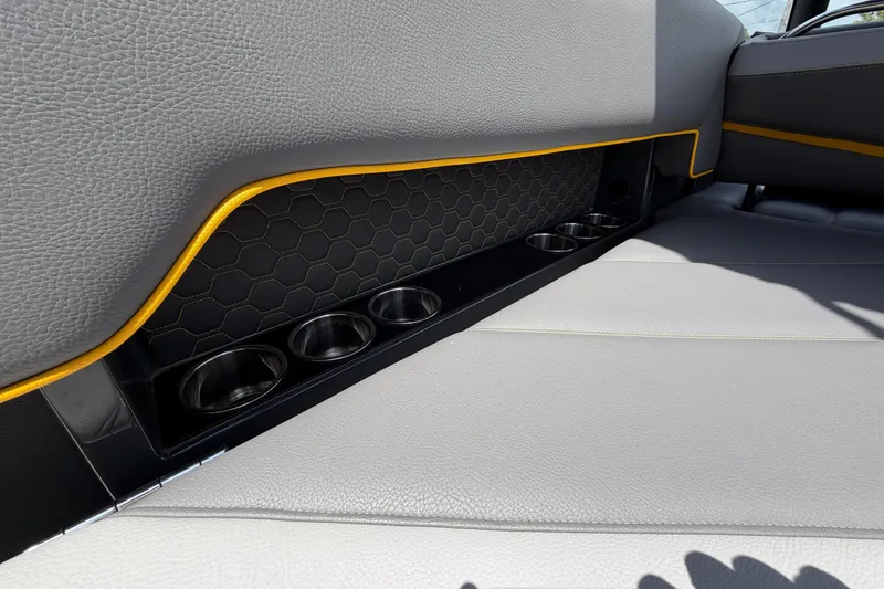 Slide: The Image of 2021 Cobalt R8 Surf interior with gray leather seats and cup holders. - 28
