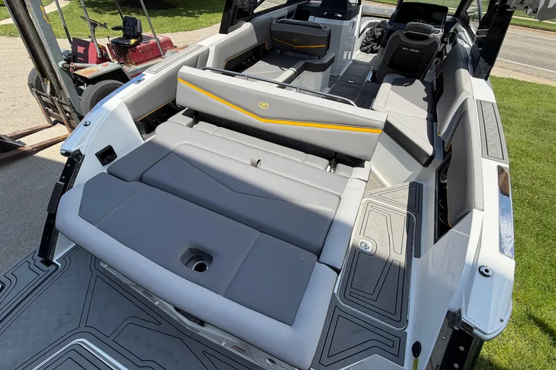 Slide: The Image of 2021 Cobalt R8 Surf boat interior with gray seating and modern design. - 29