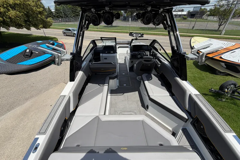 Slide: The Image of 2021 Cobalt R8 Surf boat interior with sleek seating and advanced controls. - 30