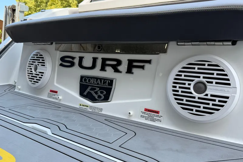 Slide: The Image of 2021 Cobalt R8 Surf boat with Roswell speakers on the deck. - 33