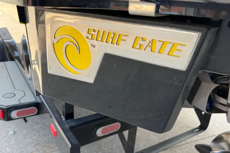 Slide: The Image of 2021 Cobalt R8 Surf boat with Surf Gate feature, close-up view. - 34