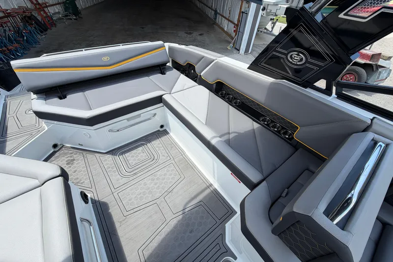 Slide: The Image of Interior of 2021 Cobalt R8 Surf boat with sleek gray seating and modern design. - 6