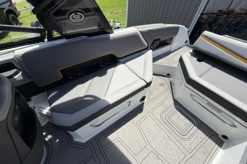 Slide: The Image of Interior of 2021 Cobalt R8 Surf boat with sleek gray seating and modern design. - 7