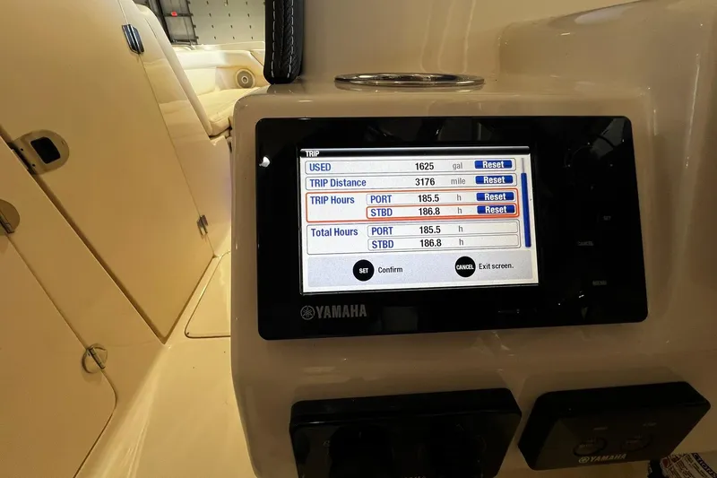 Slide: The Image of Yamaha display on 2014 Grady-White Freedom 275 showing trip data and engine hours. - 16