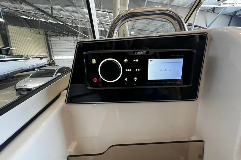 Slide: The Image of Fusion MS-UD755 stereo system on 2014 Grady-White Freedom 275 boat dashboard. - 19