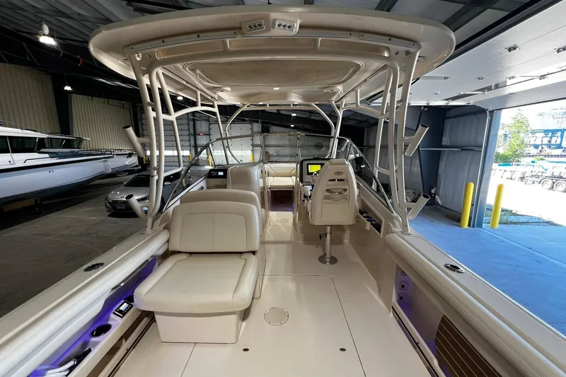 Slide: The Image of 2014 Grady-White Freedom 275 boat interior in a storage facility. - 30