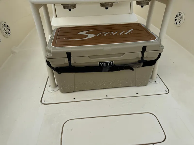 Slide: The Image of A Scout 235 XSF boat with a Yeti cooler on the deck. - 12