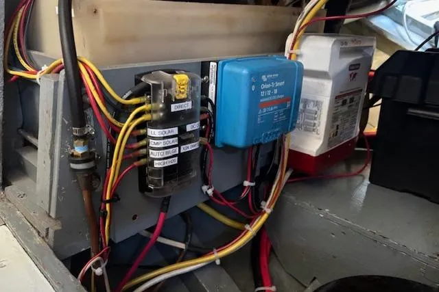Slide: The Image of Electrical panel with labeled wires and components in a 1963 Rhodes 50 boat. - 46