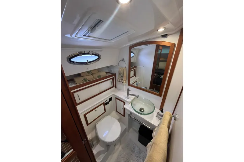Slide: The Image of Luxurious bathroom in 2018 Back Cove 41 yacht with modern fixtures and elegant design. - 19