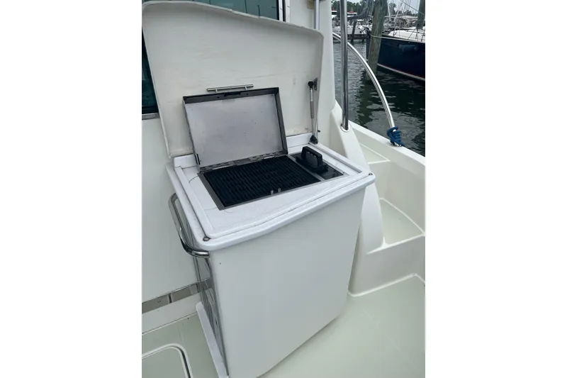 Slide: The Image of Outdoor grill on 2018 Back Cove 41 yacht, docked at marina. - 26