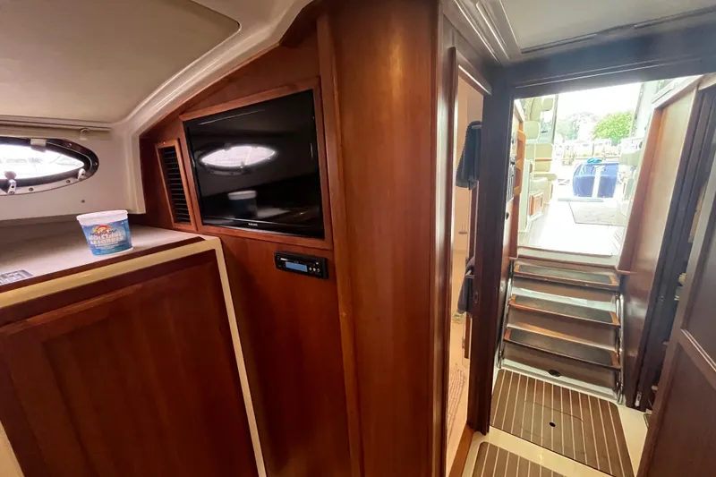Slide: The Image of Interior of 2018 Back Cove 41 yacht with wood paneling and modern amenities. - 15