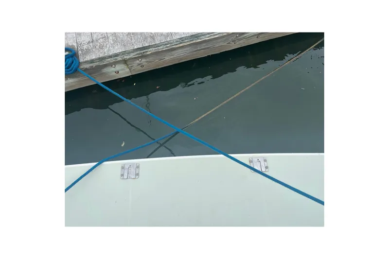Slide: The Image of Docked 2018 Back Cove 41 boat with blue mooring lines. - 28