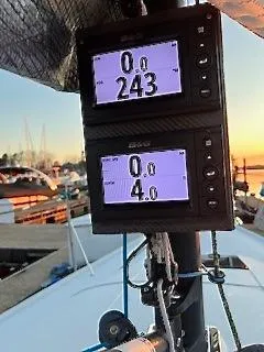 Slide: The Image of Two electronic displays on a sailboat mast show speed and heading. - 9
