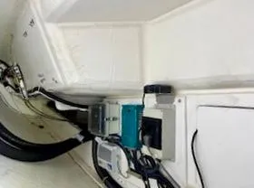 Slide: The Image of Electronic devices and cables inside a boat. - 19