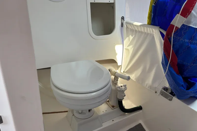 Slide: The Image of 2015 J Boats J/88 interior showing compact marine toilet setup. - 27