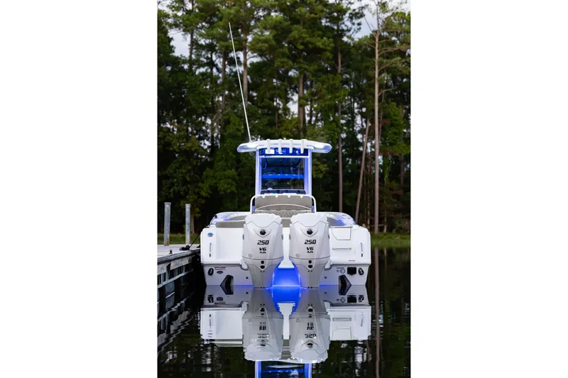 Slide: The Image of 2026 Sea Hunt Ultra 275 Coffin Box boat docked, featuring dual 250 V6 engines. - 40