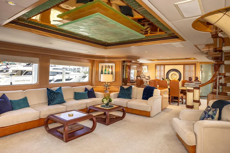 Slide: The Image of Luxurious interior of 1998 Trinity Yachts model, featuring elegant seating and decor. - 14