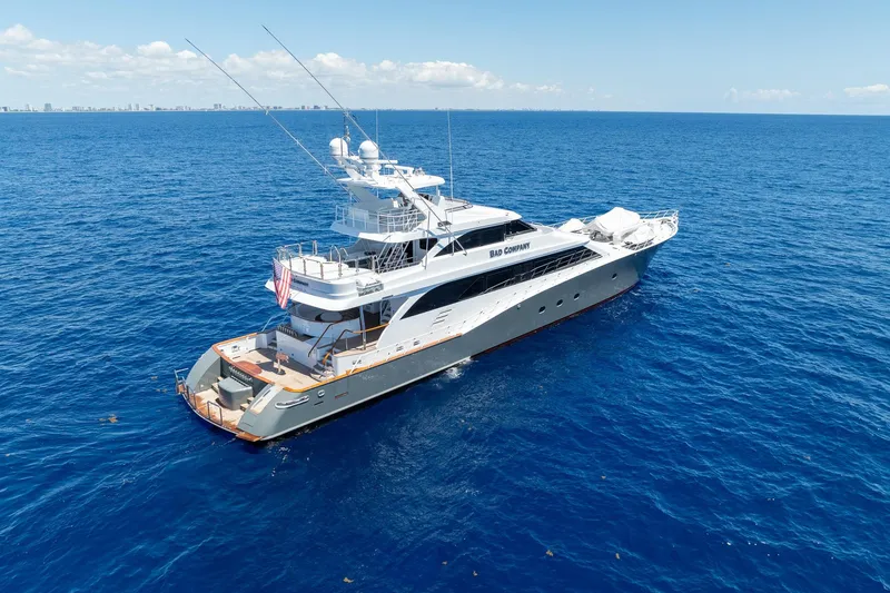 Slide: The Image of Luxurious 1998 Trinity Yachts vessel cruising on open blue ocean waters. - 5