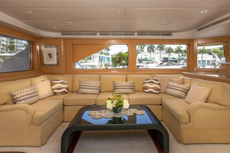 Slide: The Image of Luxurious 1998 Trinity Yachts interior with elegant beige seating and decorative cushions. - 50