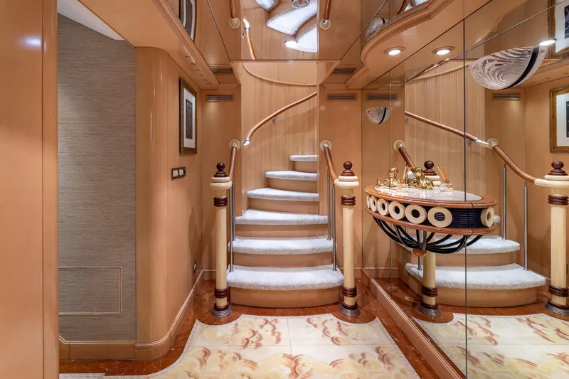 Slide: The Image of Luxurious yacht interior with elegant staircase and mirrored walls, Trinity Yachts 1998 model. - 24