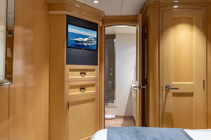Slide: The Image of Luxurious interior of 1998 Trinity Yachts model, featuring elegant wood paneling and modern amenities. - 45