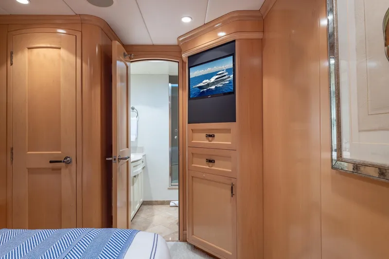 Slide: The Image of Luxurious 1998 Trinity Yachts interior with wooden cabinetry and modern amenities. - 41