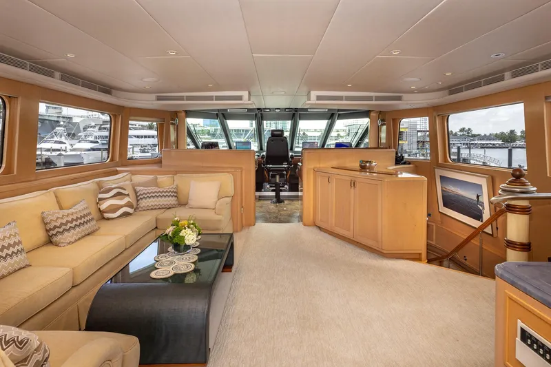 Slide: The Image of Luxurious interior of a 1998 Trinity Yachts model, featuring elegant seating and decor. - 47