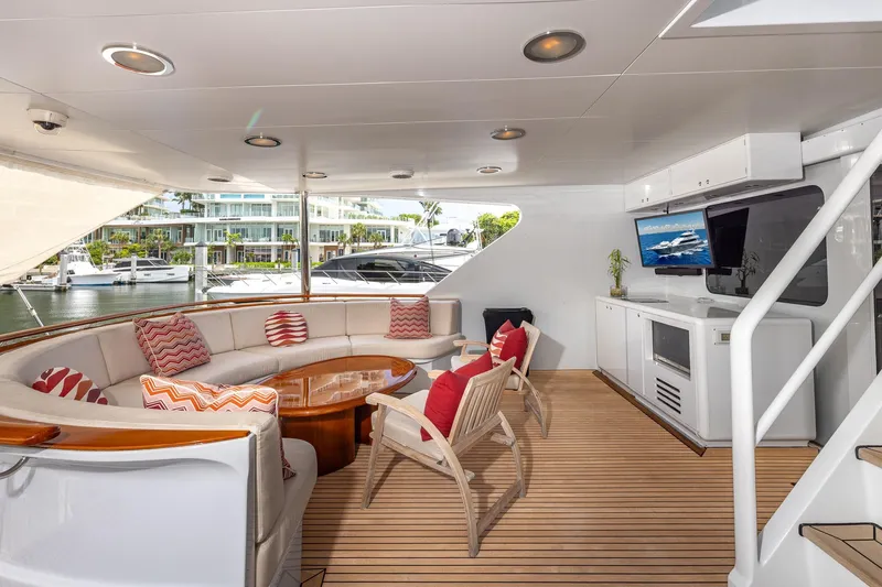 Slide: The Image of Luxurious 1998 Trinity Yachts interior with elegant seating, wooden flooring, and modern amenities. - 12