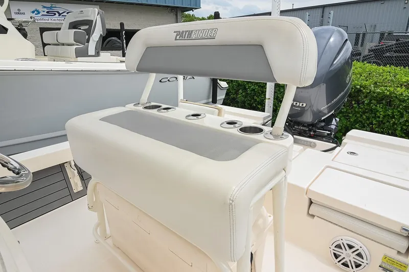 Slide: The Image of 2021 Pathfinder 2200 TRS boat with Yamaha engine, featuring cushioned seating and cup holders. - 36
