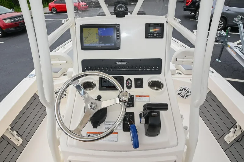 Slide: The Image of 2021 Pathfinder 2200 TRS boat console with Garmin navigation and Yamaha controls. - 31