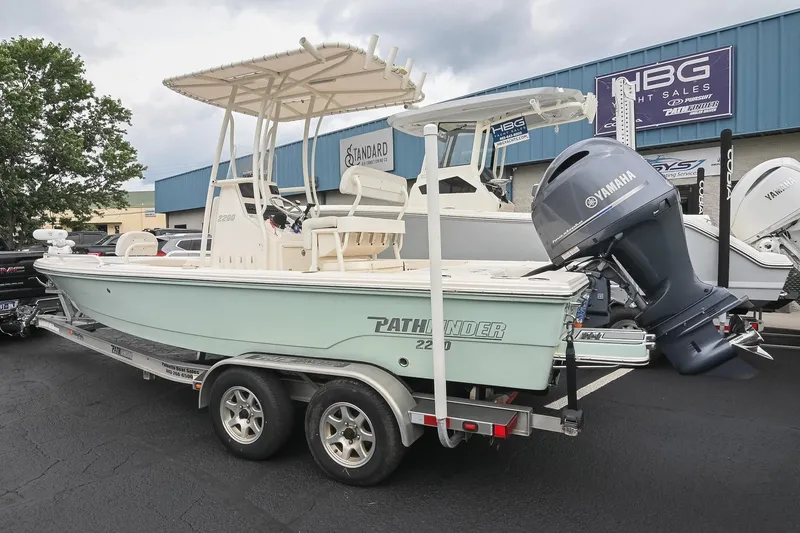 Slide: The Image of 2021 Pathfinder 2200 TRS boat with Yamaha engine on trailer at dealership. - 15