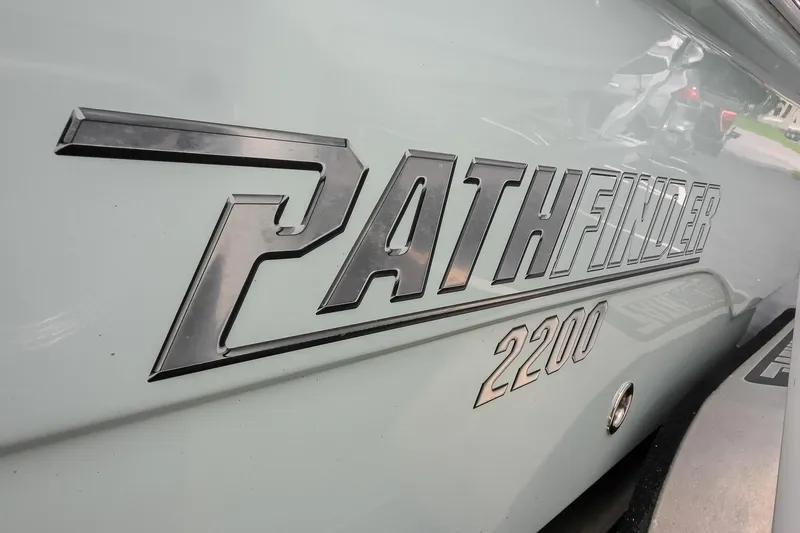 Slide: The Image of 2021 Pathfinder 2200 TRS boat logo on sleek exterior surface. - 17