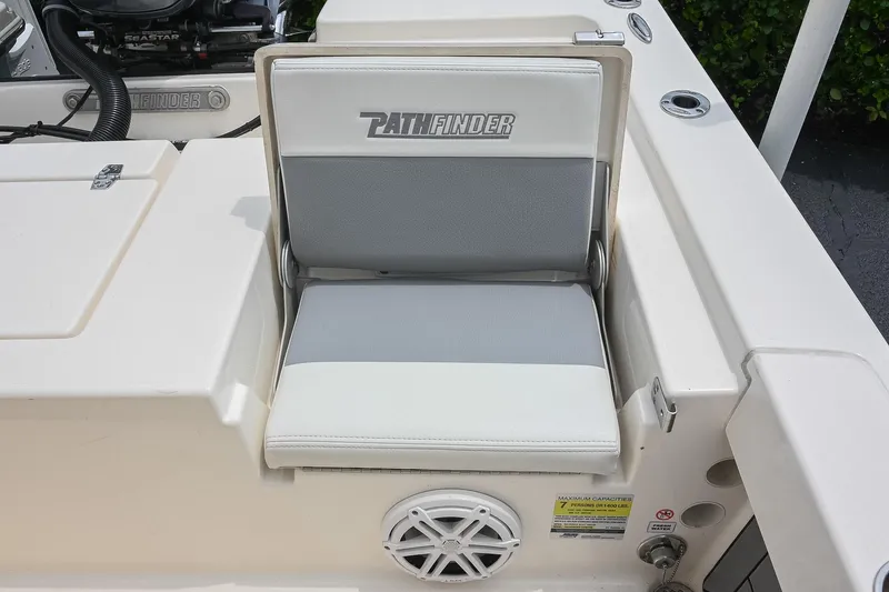 Slide: The Image of 2021 Pathfinder 2200 TRS boat seat with logo and speaker detail. - 23
