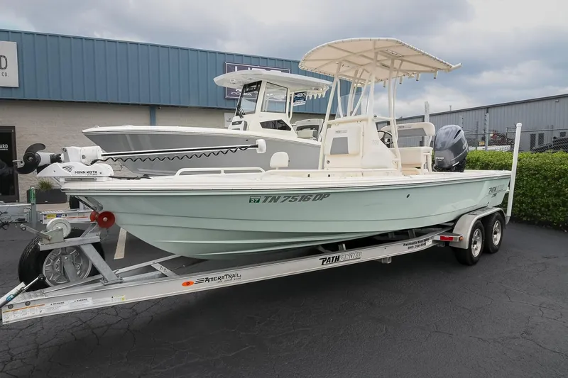 The Image of 2021 Pathfinder 2200 TRS boat on trailer, parked outside dealership. - 13