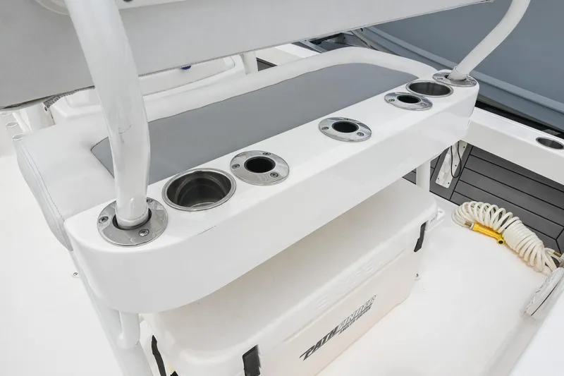 Slide: The Image of 2021 Pathfinder 2200 TRS boat seating with integrated cup holders and storage. - 26