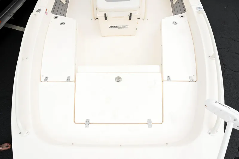 Slide: The Image of 2021 Pathfinder 2200 TRS boat deck with storage compartments and Minn Kota trolling motor. - 49
