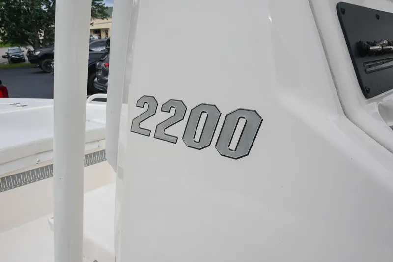 Slide: The Image of Close-up of 2021 Pathfinder 2200 TRS boat model number on white surface. - 18