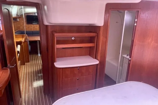 Slide: The Image of Interior of 2007 Hunter 45 Center Cockpit yacht with wood finish and modern amenities. - 15