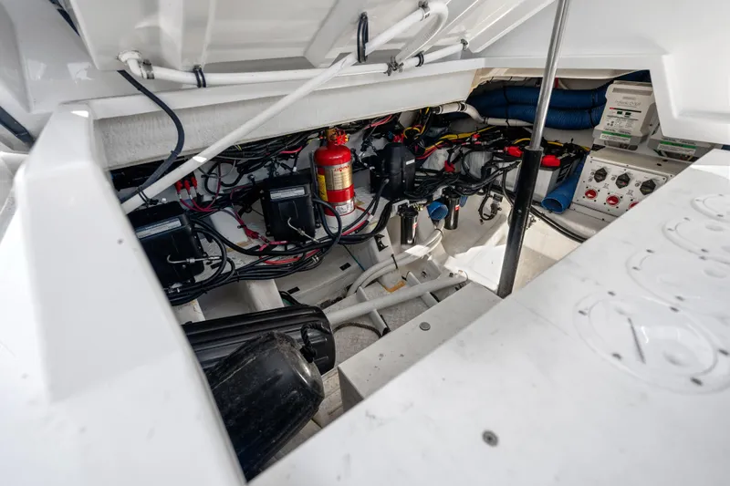 Slide: The Image of Engine compartment of 2020 Cruisers Yachts 38 GLS OB, showcasing wiring and components. - 21