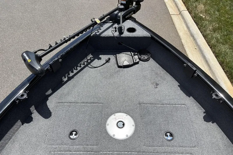 Slide: The Image of 2025 Tracker Pro Guide V-16 WT boat deck with Minn Kota trolling motor. - 6