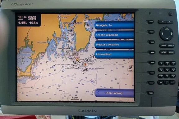 Slide: The Image of Garmin GPSmap 4212 displaying nautical chart on Thompson Passenger and Dive Trawler, 1980 model. - 4