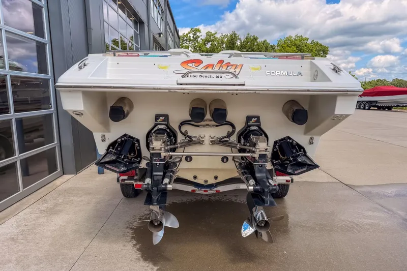 Slide: The Image of Rear view of a 2002 Formula 382 FASTech boat with dual propellers. - 17