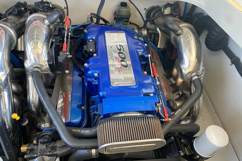 Slide: The Image of Engine of a 2002 Formula 382 FASTech boat, featuring a Mercury 500 EFI motor. - 31