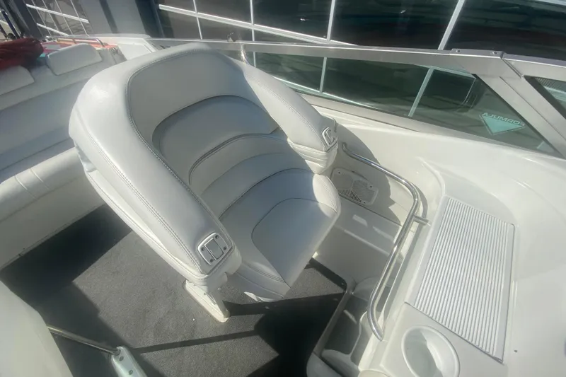 Slide: The Image of 2002 Formula 382 FASTech boat interior with white leather seating and modern design. - 36