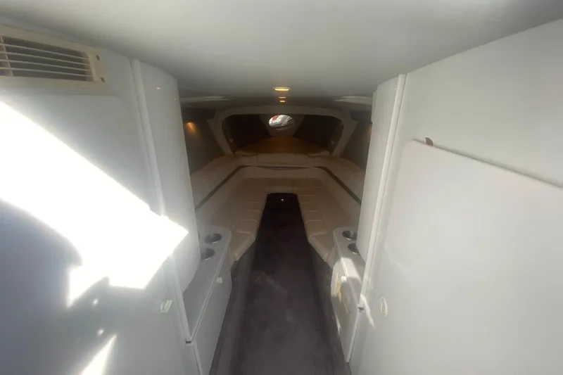 Slide: The Image of Interior of a 2002 Formula 382 FASTech boat, featuring a spacious cabin layout. - 41