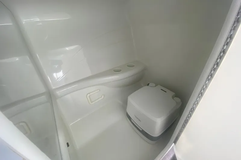 Slide: The Image of Compact bathroom in 2002 Formula 382 FASTech boat with portable toilet. - 48
